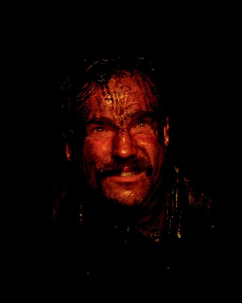 Still from There Will Be Blood — Plainview reading the land